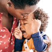 child showing emotion with caregiver